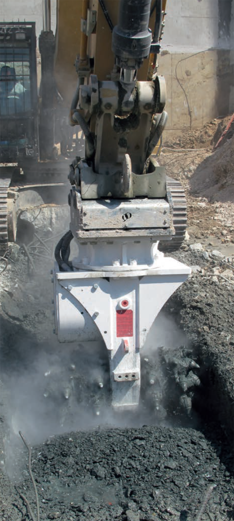 Erkat Drum Cutter in use cutting trench